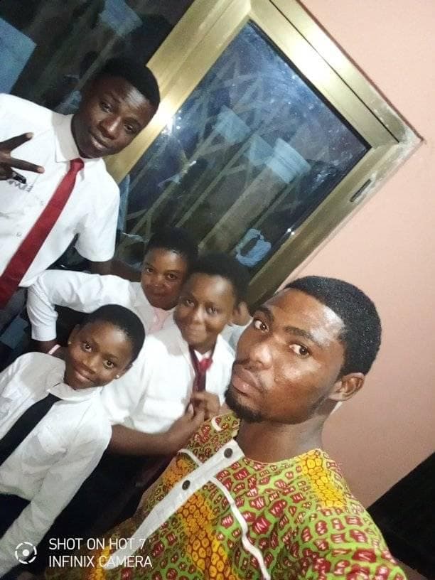 Richard with community children
